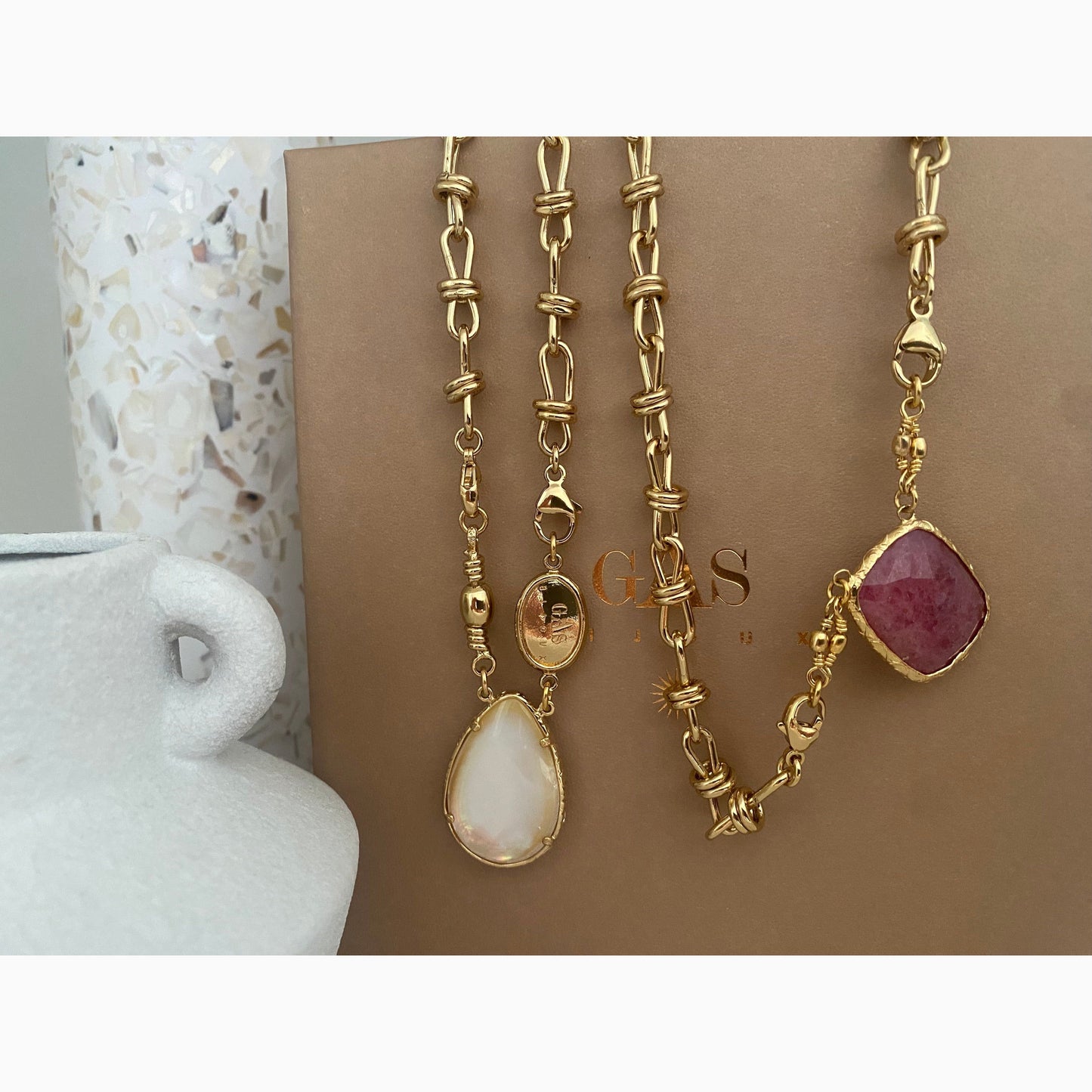 Discover the versatile Scapulaire Billy Necklace, boasting exquisite 24k gold plating and adorned with semi-precious stones.