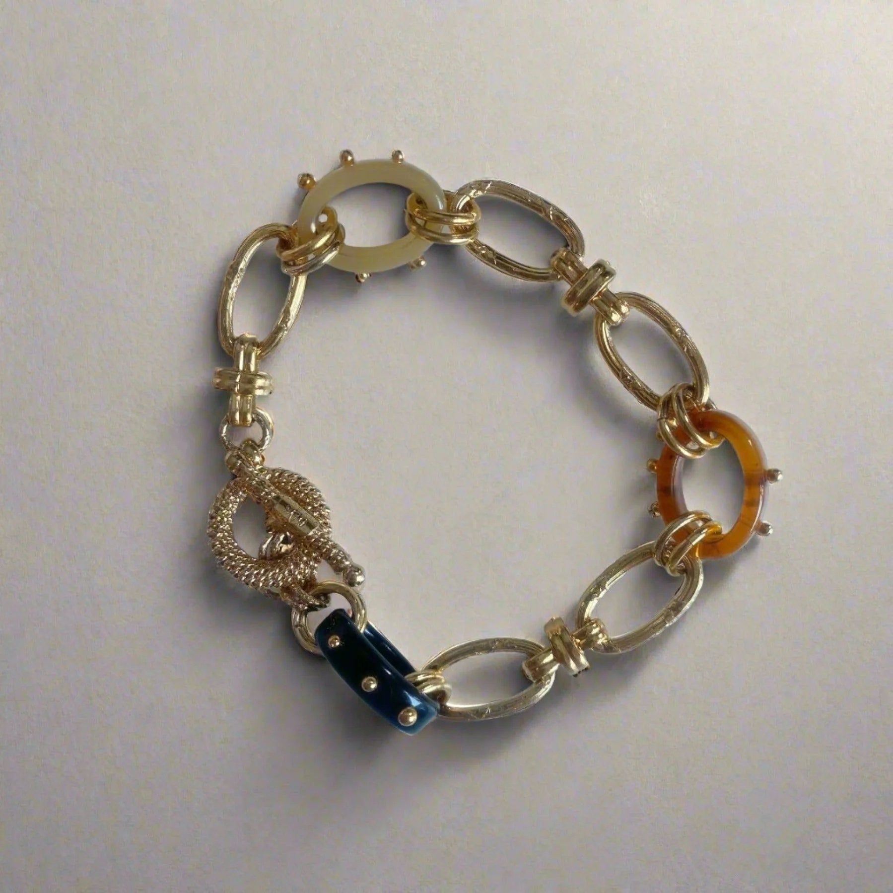Crafted from 24K gold-plated material, this bracelet exudes luxury and sophistication. With a length of 18-19 cm and a width of 2.5 cm, it offers both style and comfort.