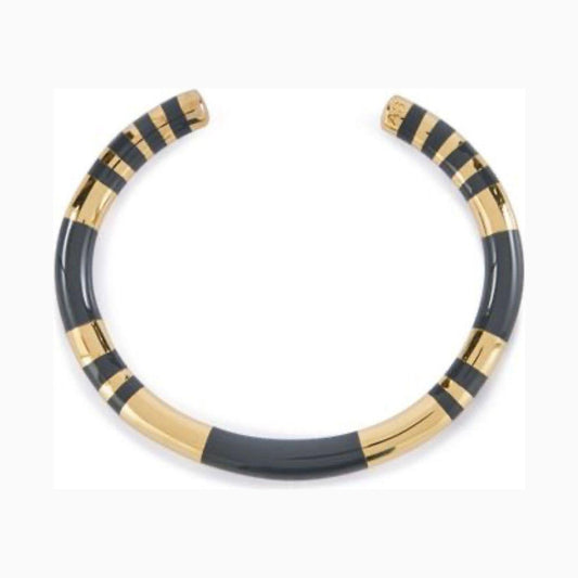 Elevate your style with the Aurèlie Bidermann Positano two-tone grey resin and gold bangle, featuring a chic combination of resin and gilded 750/1000 yellow gold.
