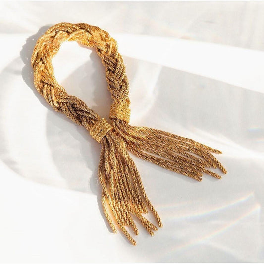 Crafted from exquisite 750/1000 yellow gold, this bracelet features a sleek paperclip fastening, adding a modern twist to its classic design. The innovative clip allows for easy adjustment, ensuring the perfect fit for any wrist size.