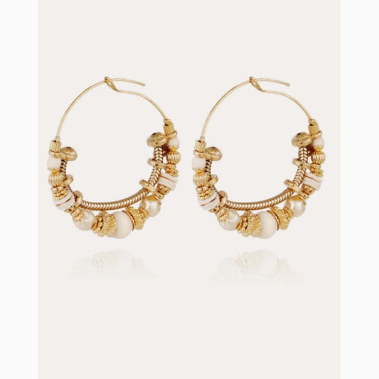 Introducing the captivating Gas Bijoux Comedia serti gold hoops, exquisite gold-plated earrings adorned with sparkling gemstones and golden beads.
