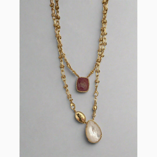 Discover the versatile Scapulaire Billy Necklace, boasting exquisite 24k gold plating and adorned with semi-precious stones.