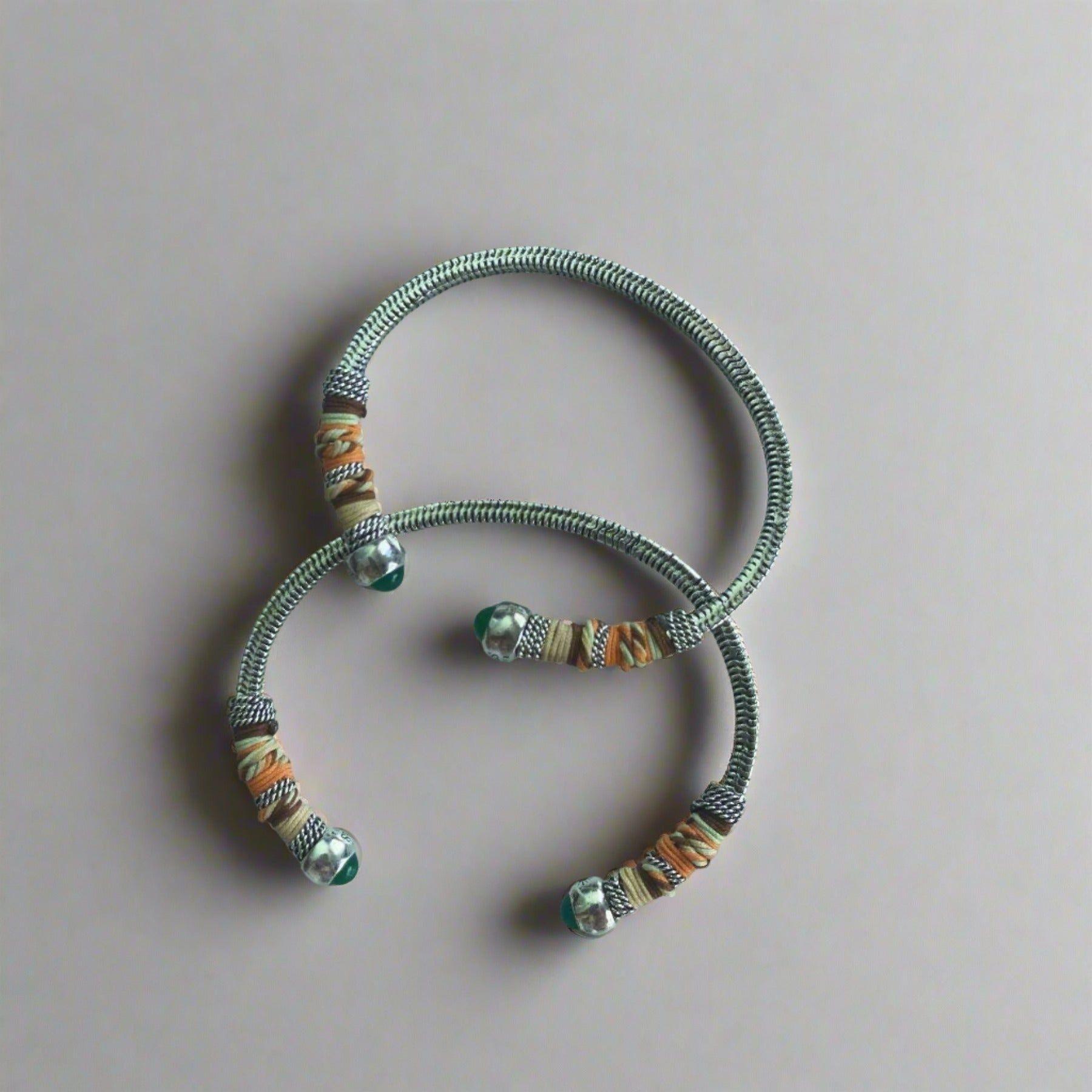 This adjustable bangle offers both style and versatility, with a width of 0.7cms and a circumference of 16.5cms. Elevate your wrist with this exquisite piece, perfect for adding a touch of artisanal charm to any ensemble.
